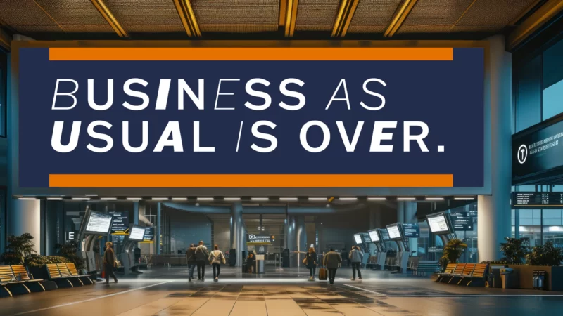 Airport banner announcing Business as usual is over.